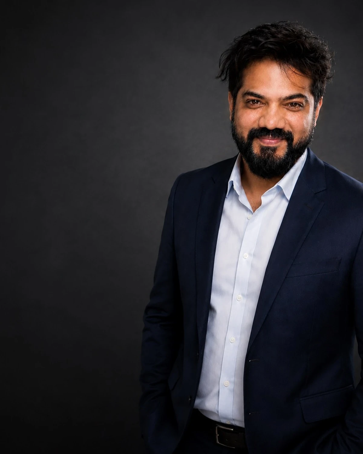 Vertical press headshot of Harshit Mhatre